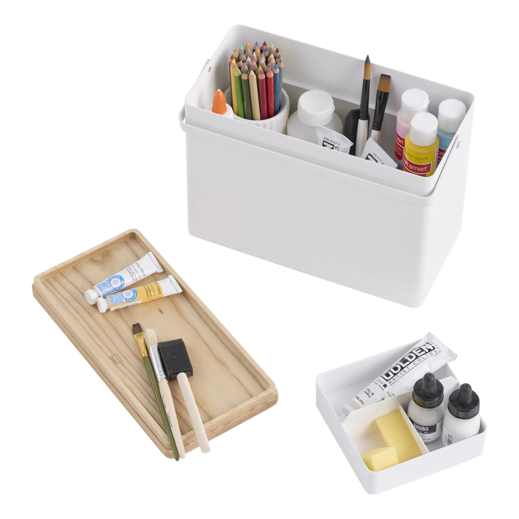 White Yamazaki Home First Aid Box with art supplies, featuring containers for paint, brushes, and colored pencils.